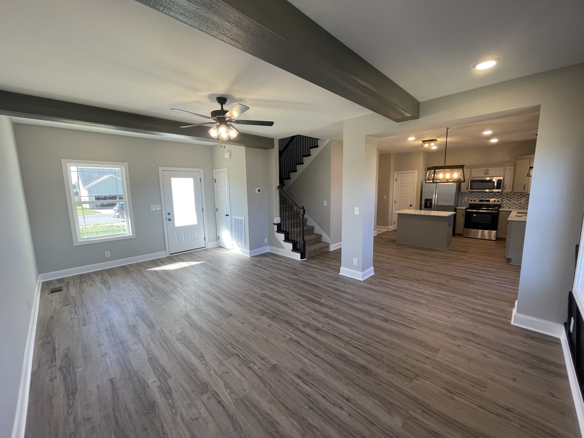 5 Hop Smith Road Cumberland Furnace, TN 37051 - Photo 12 of 23 wooden floor in an empty room with a window