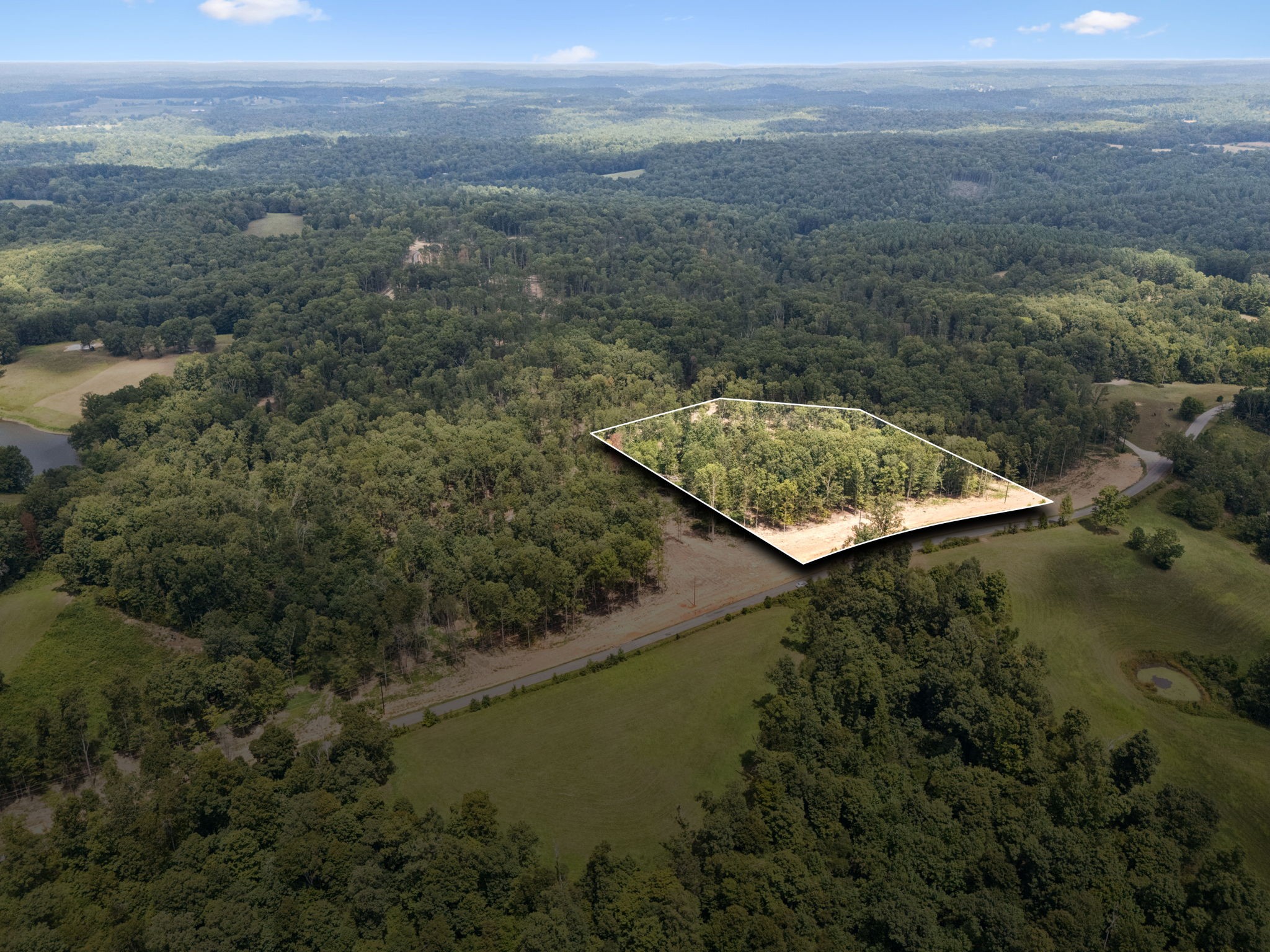 5 Hop Smith Road Cumberland Furnace, TN 37051 - Photo 16 of 23 an aerial view of a house with a yard