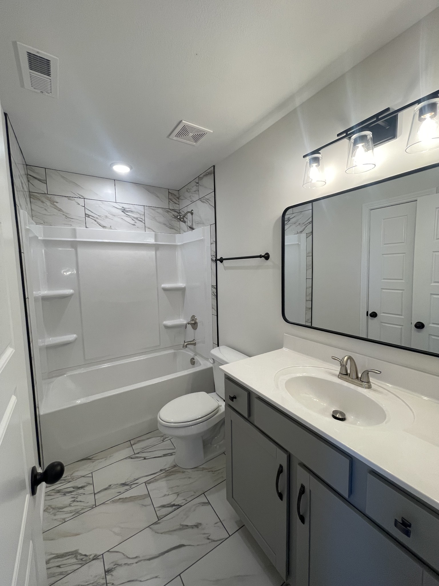 5 Hop Smith Road Cumberland Furnace, TN 37051 - Photo 3 of 23 a bathroom with a sink a toilet a mirror and shower