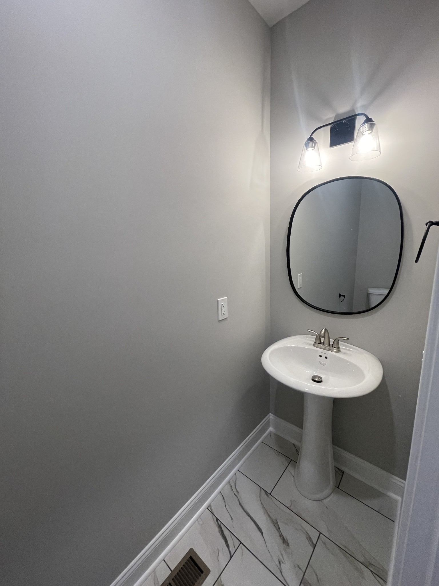 5 Hop Smith Road Cumberland Furnace, TN 37051 - Photo 6 of 23 a bathroom with a sink and mirror