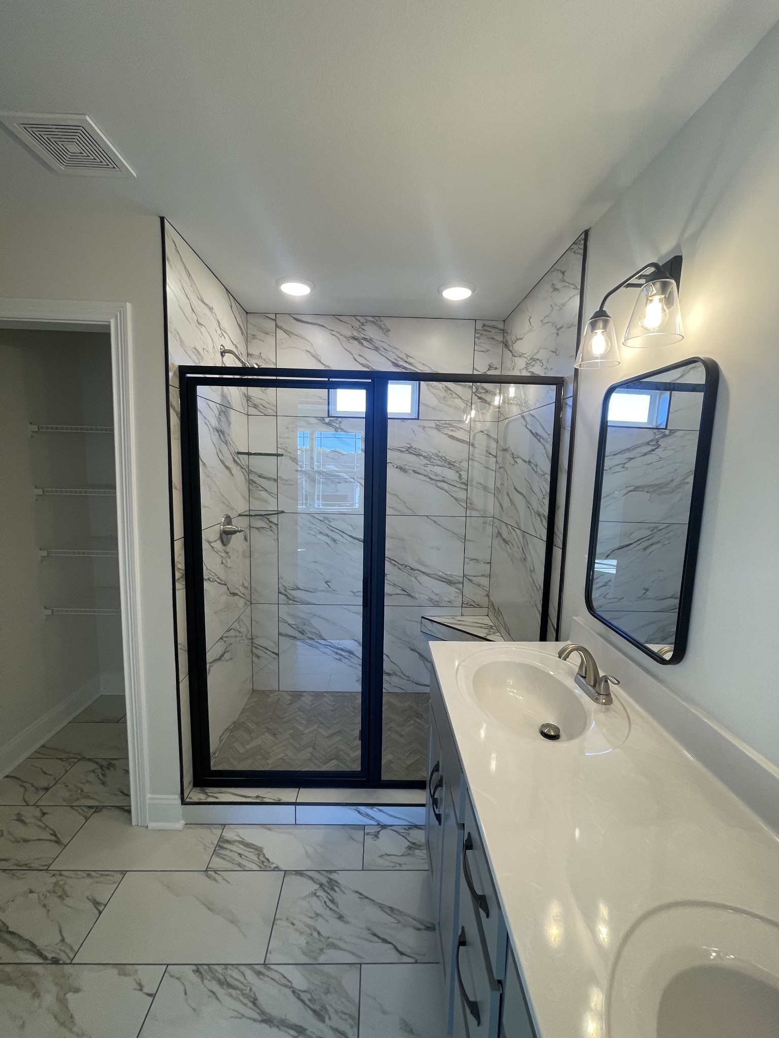 5 Hop Smith Road Cumberland Furnace, TN 37051 - Photo 10 of 23 a bathroom with a sink a mirror and shower