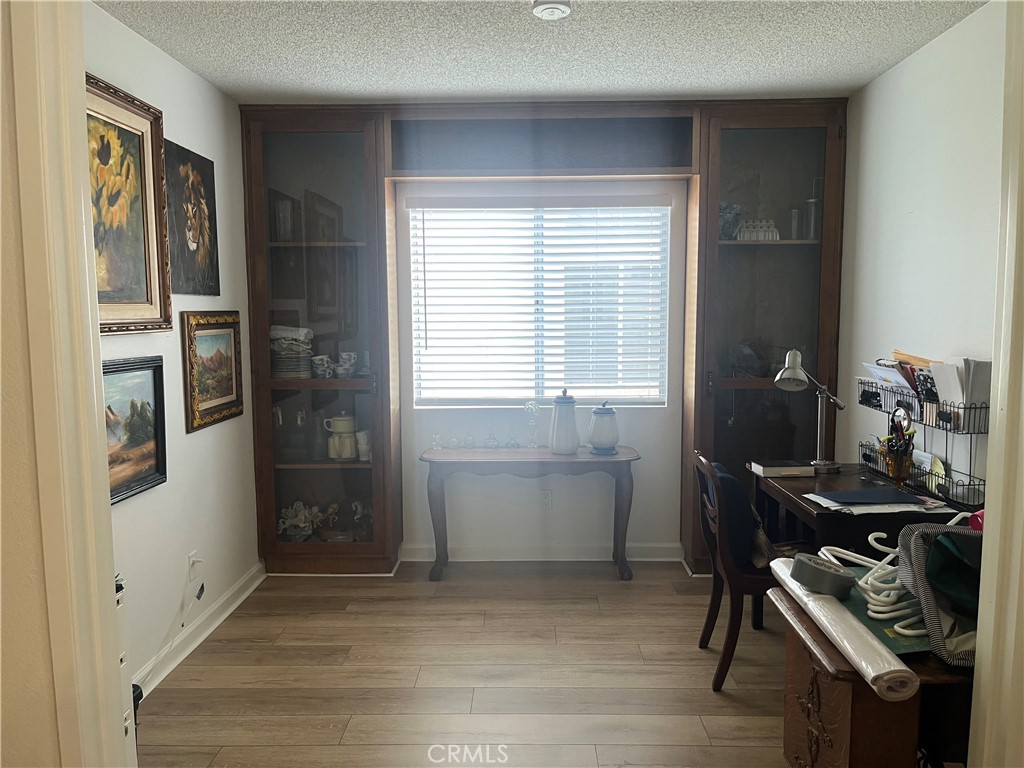 637 Torrey Pines Road Banning, CA 92220 - Photo 14 of 24 a workspace with furniture and window