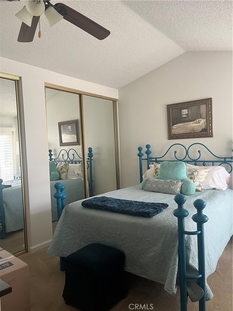 637 Torrey Pines Road Banning, CA 92220 - Photo 21 of 24 a bedroom with a bed and wooden floor