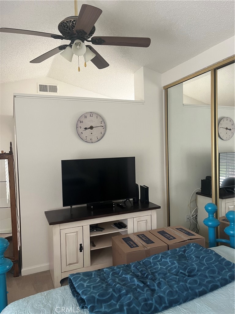 637 Torrey Pines Road Banning, CA 92220 - Photo 24 of 24 a living room with furniture and a flat screen tv