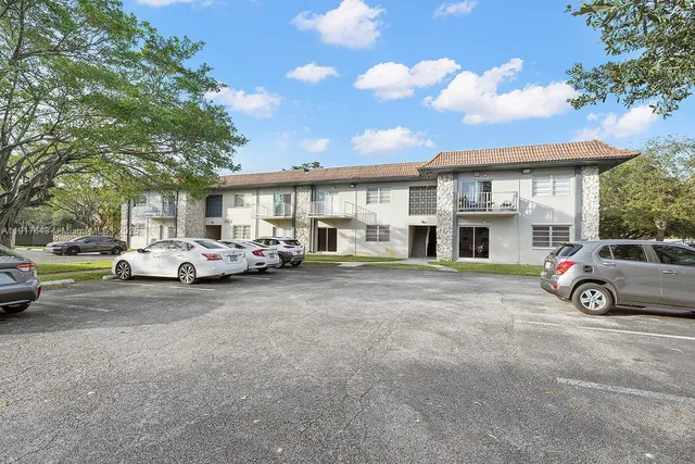 a car parked in front of a house