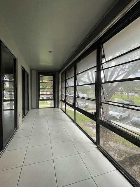 9499 West McNab Road, Unit 208 Tamarac, FL 33321 - Photo 13 of 19 a view of an empty room with a window