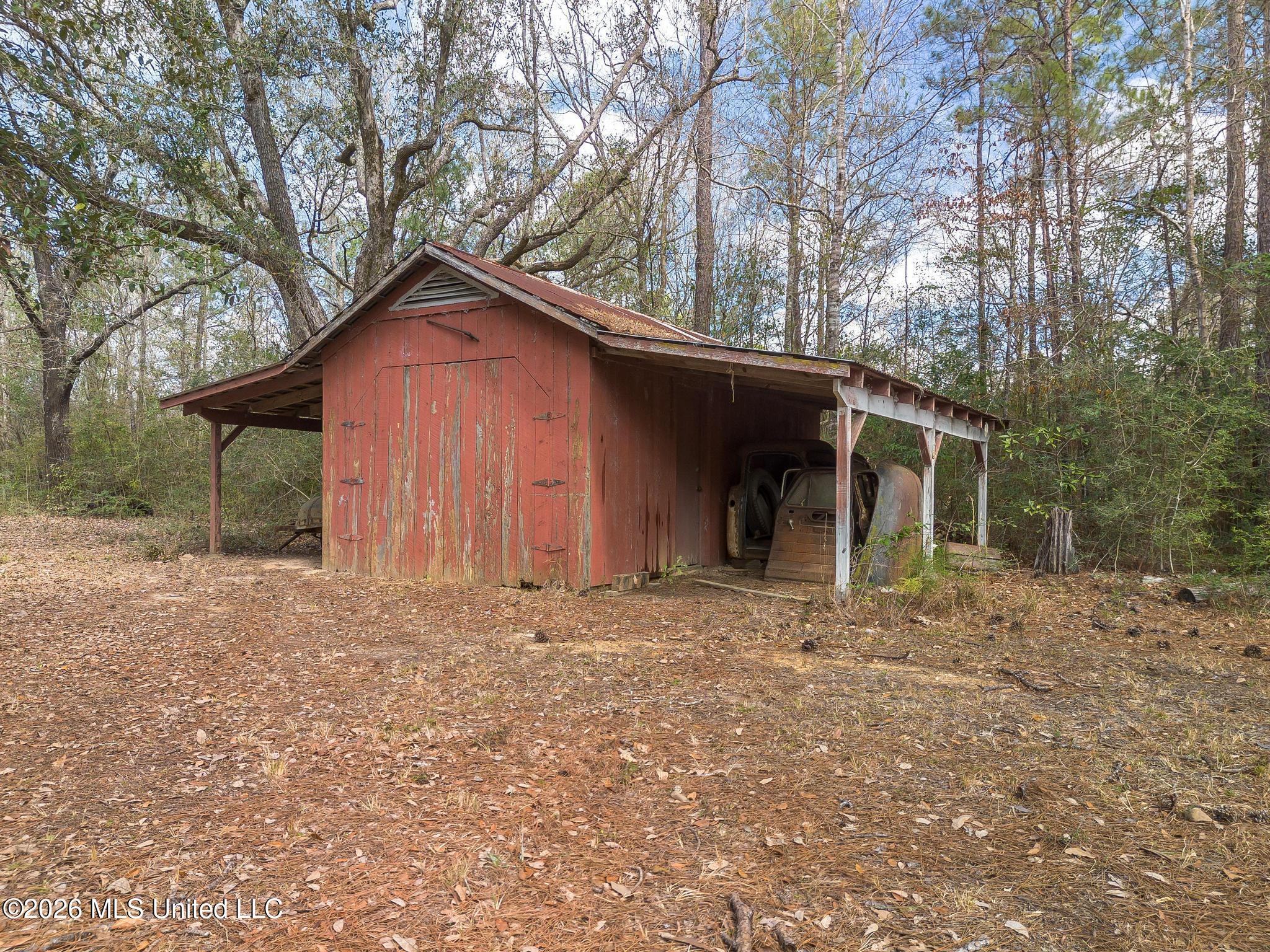 23676 East Dubuisson Road Pass Christian, MS 39571 - Photo 49 of 73 barndominium shed