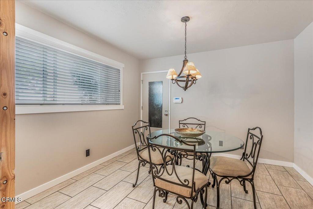 541 Broderick Way Port Hueneme, CA 93041 - Photo 20 of 35 a dining room with a table and chairs