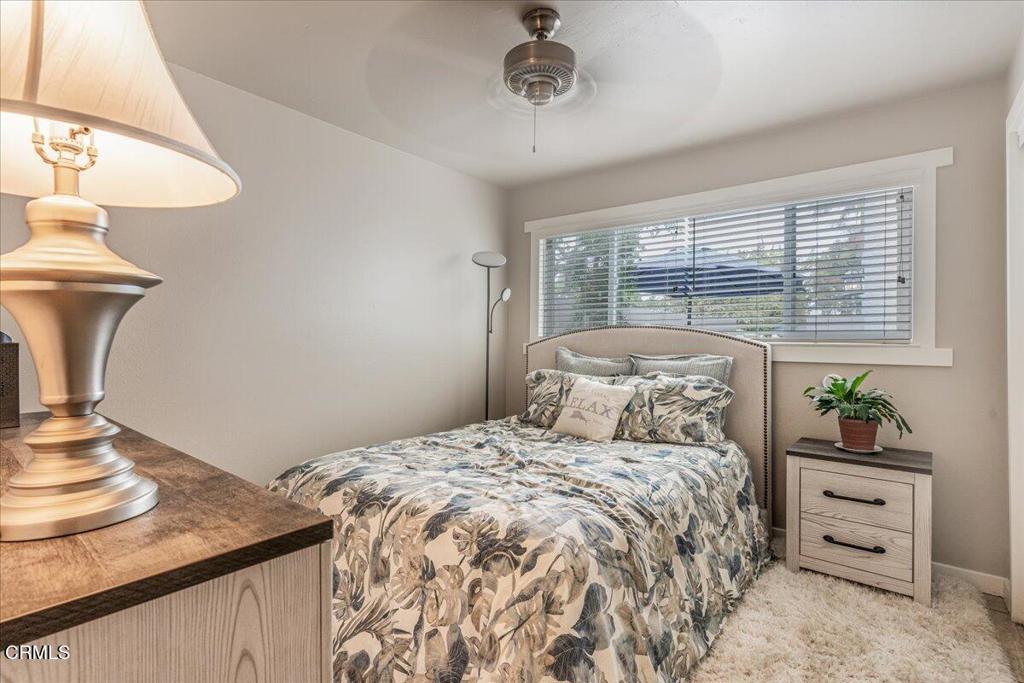 541 Broderick Way Port Hueneme, CA 93041 - Photo 23 of 35 a bedroom with a bed and a table