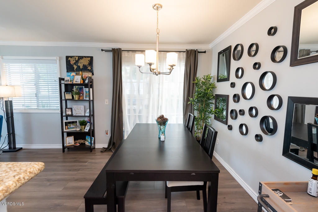 1135 Fitzgerald Road, Unit A Simi Valley, CA 93065 - Photo 13 of 49 a view of a dining room with furniture and wooden floor