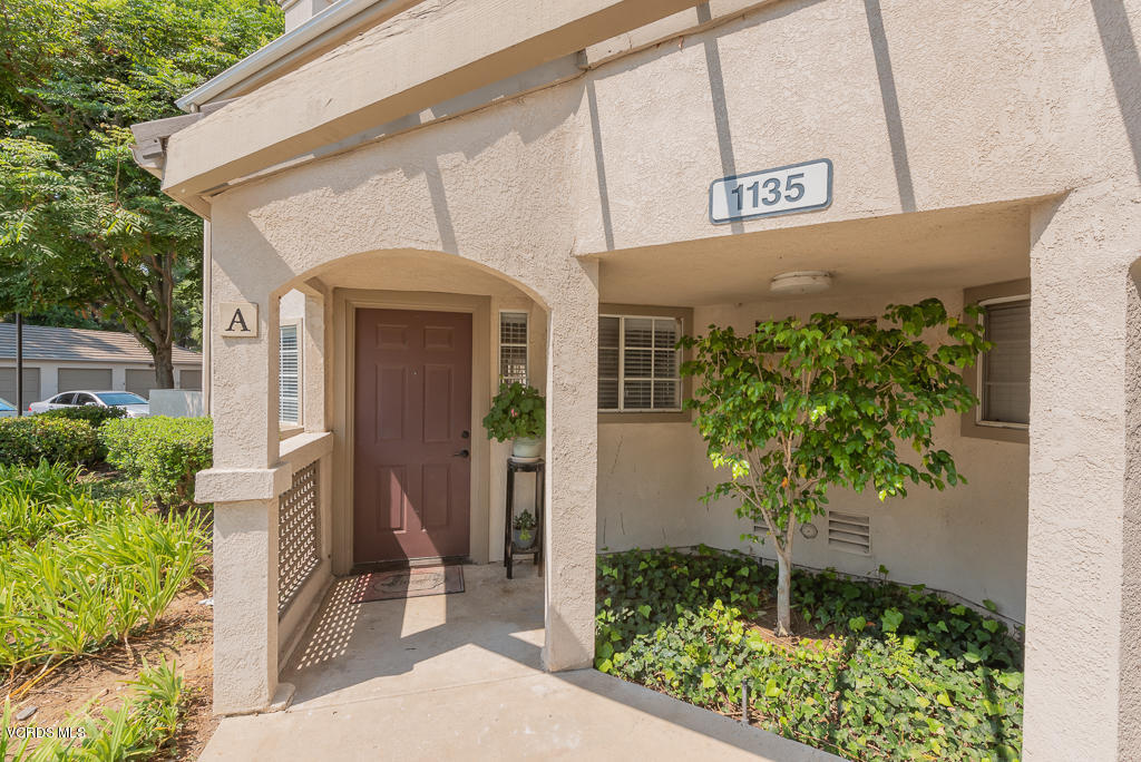 1135 Fitzgerald Road, Unit A Simi Valley, CA 93065 - Photo 3 of 49 a front view of a house with garden