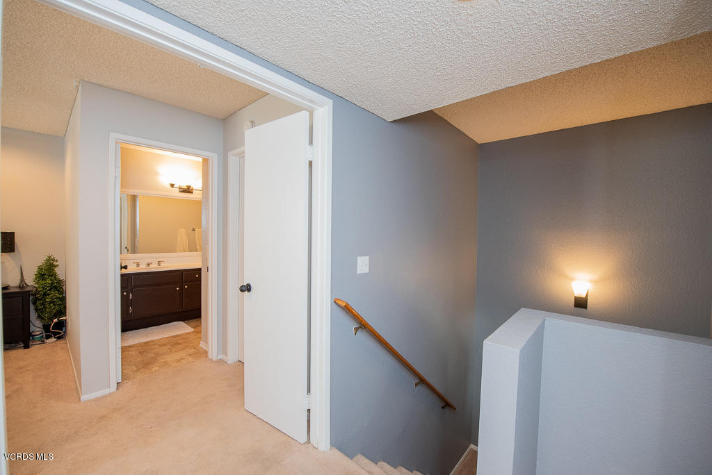 1135 Fitzgerald Road, Unit A Simi Valley, CA 93065 - Photo 22 of 49 a view of an empty room and fire place