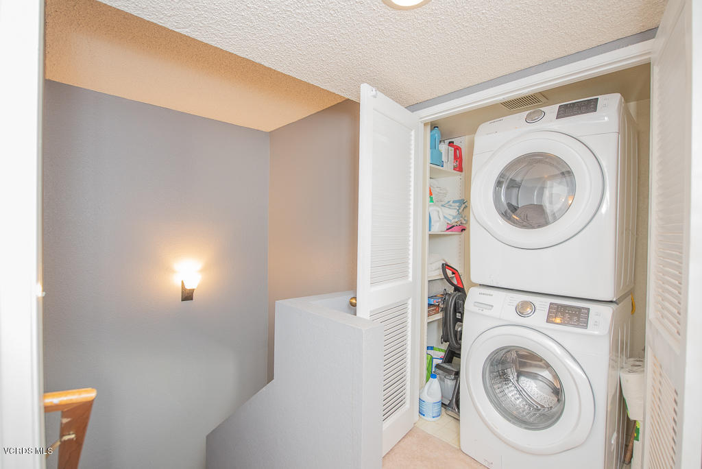 1135 Fitzgerald Road, Unit A Simi Valley, CA 93065 - Photo 31 of 49 a utility room with dryer and washer