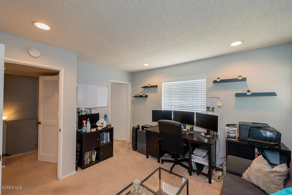 1135 Fitzgerald Road, Unit A Simi Valley, CA 93065 - Photo 32 of 49 a view of a workspace with furniture