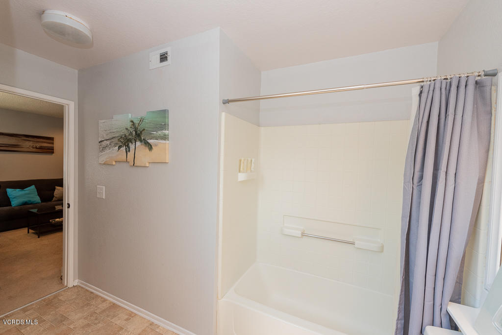 1135 Fitzgerald Road, Unit A Simi Valley, CA 93065 - Photo 37 of 49 a bathroom with a shower