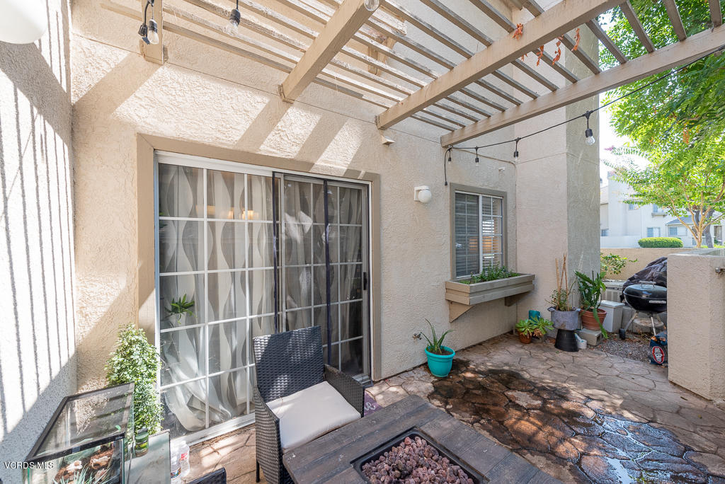 1135 Fitzgerald Road, Unit A Simi Valley, CA 93065 - Photo 40 of 49 a view of a porch with furniture