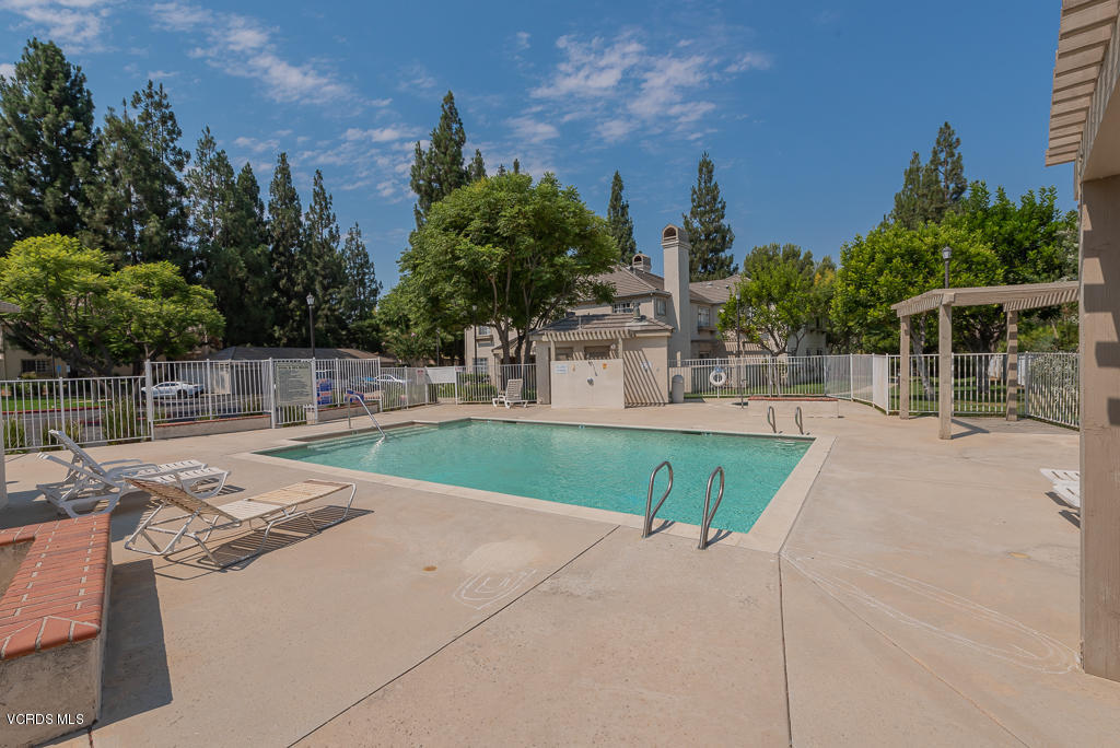 1135 Fitzgerald Road, Unit A Simi Valley, CA 93065 - Photo 43 of 49 a view of a swimming pool with a patio