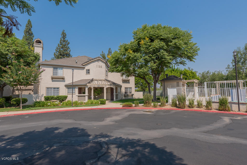1135 Fitzgerald Road, Unit A Simi Valley, CA 93065 - Photo 49 of 49 a front view of a building with trees