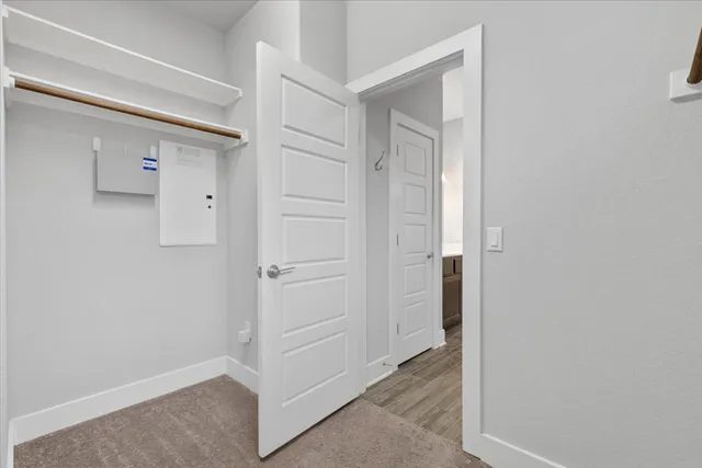 a view of an empty walk in closet