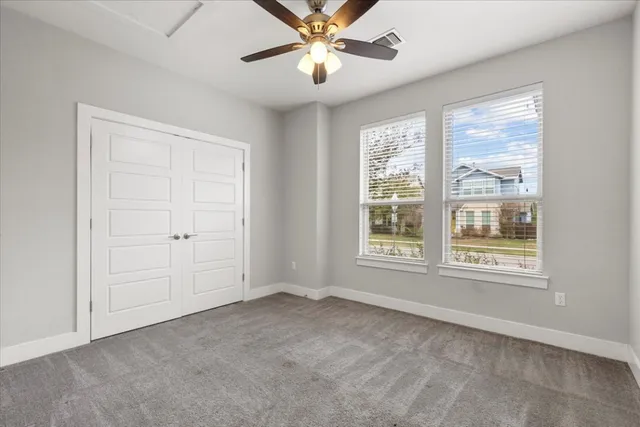 a view of an empty walk in closet