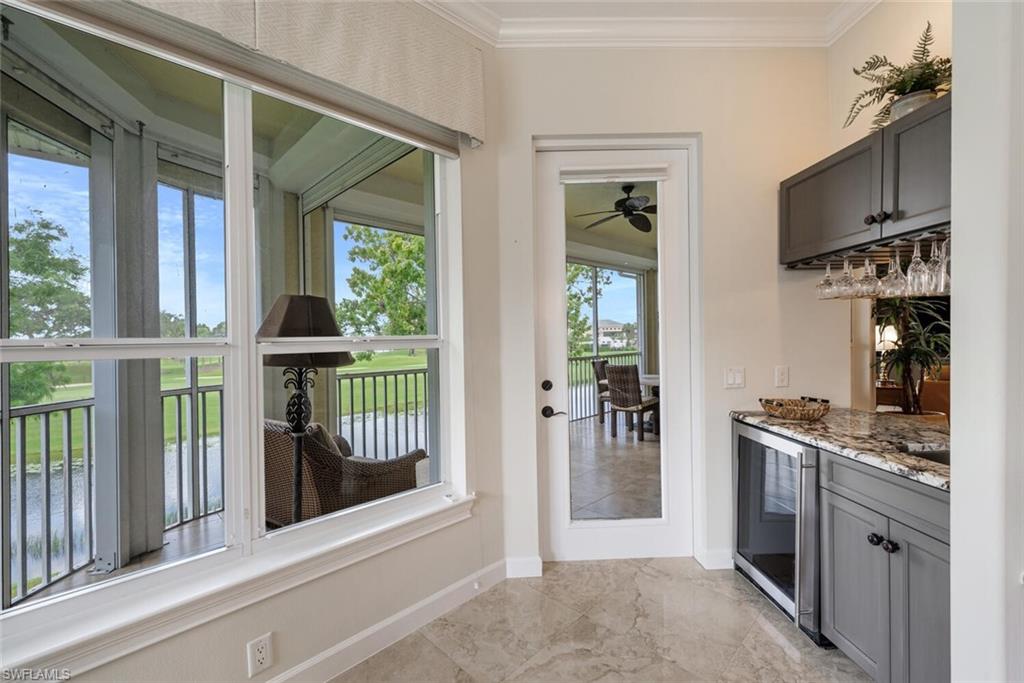 3019 Lancaster Drive, Unit 3 Naples, FL 34105 - Photo 20 of 35 a view of a kitchen from the hallway