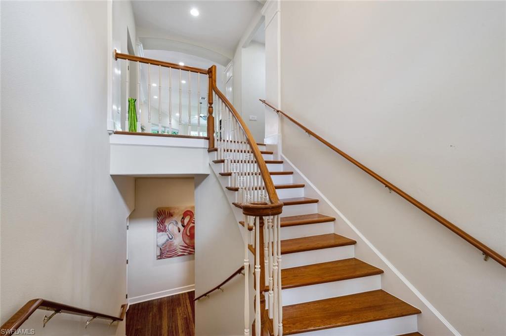 3019 Lancaster Drive, Unit 3 Naples, FL 34105 - Photo 2 of 35 a view of entryway and hall with wooden floor