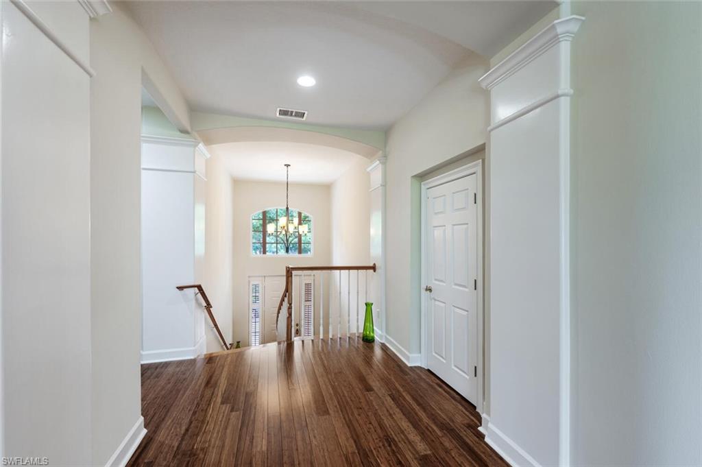3019 Lancaster Drive, Unit 3 Naples, FL 34105 - Photo 3 of 35 a view of entryway with wooden floor