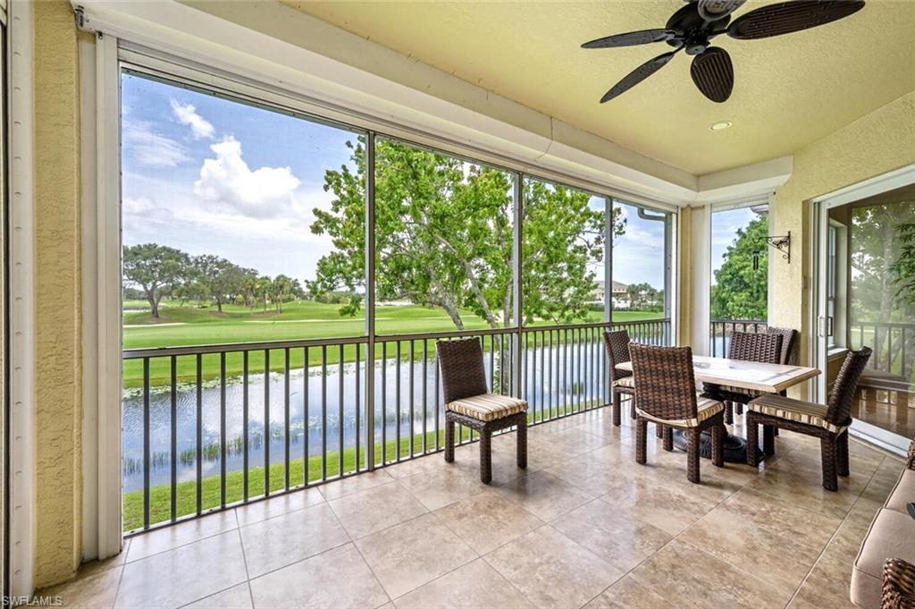 3019 Lancaster Drive, Unit 3 Naples, FL 34105 - Photo 32 of 35 a view of a porch with furniture and a yard