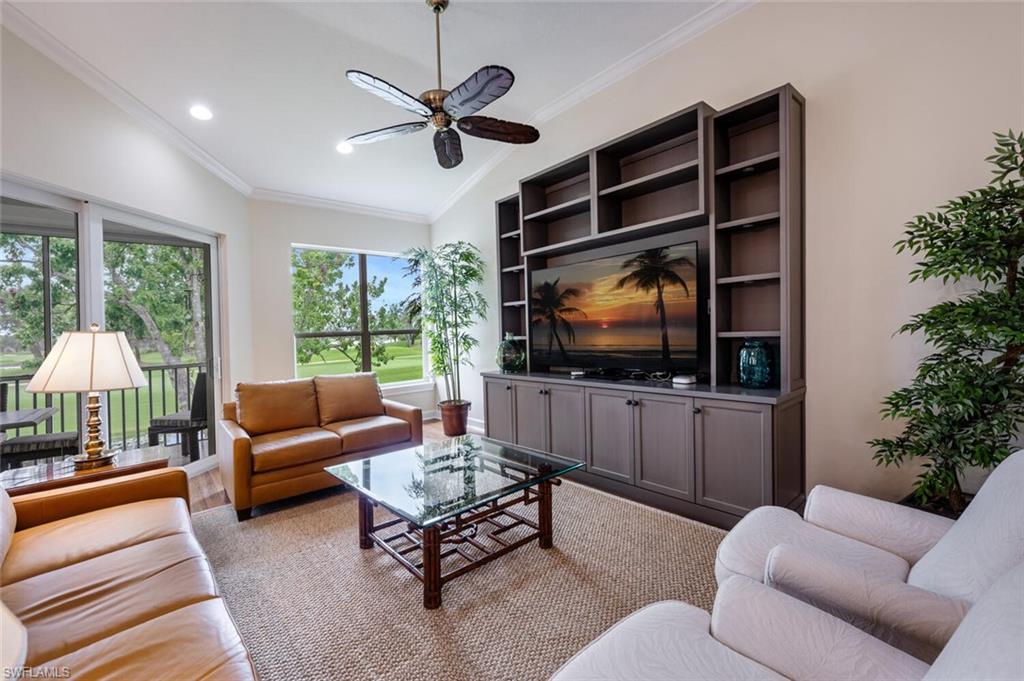 3019 Lancaster Drive, Unit 3 Naples, FL 34105 - Photo 6 of 35 a living room with furniture and a flat screen tv
