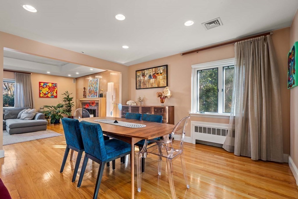 52 Sherbrooke Road Newton, MA 02458 - Photo 16 of 35 a view of a dining room with furniture window and wooden floor
