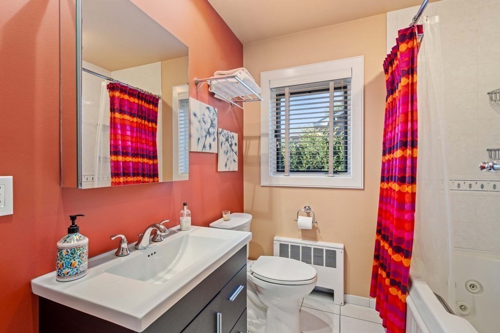 52 Sherbrooke Road Newton, MA 02458 - Photo 23 of 35 a bathroom with a sink vanity mirror and toilet