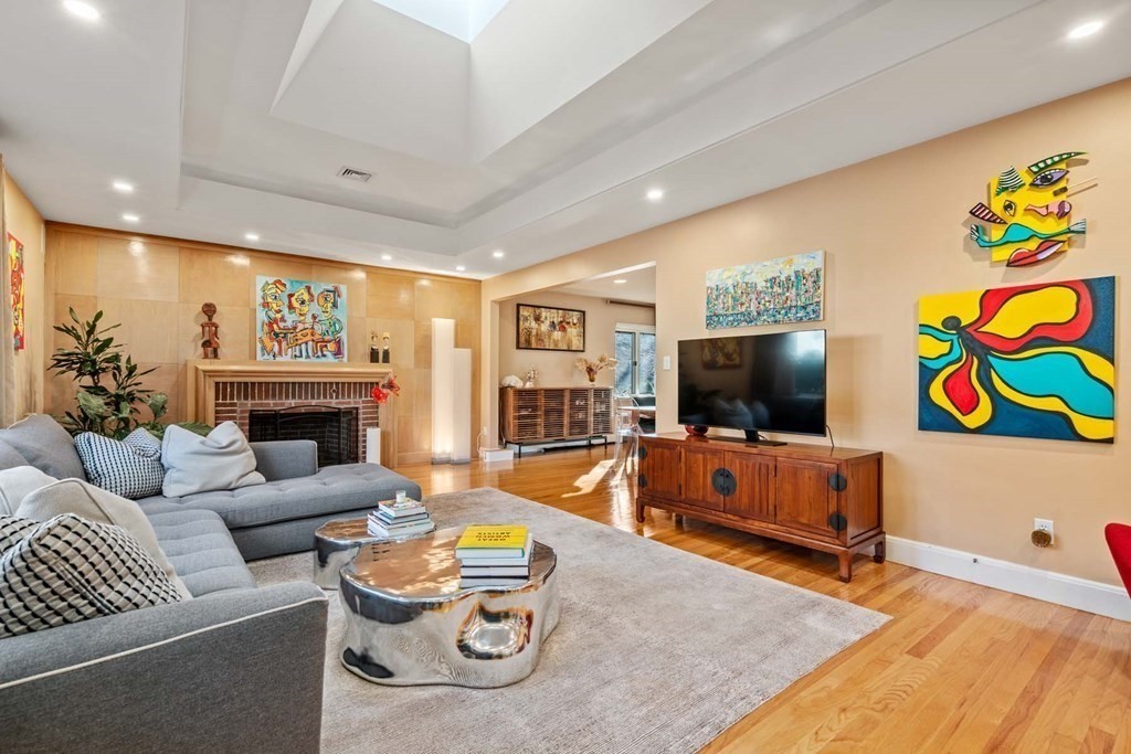 52 Sherbrooke Road Newton, MA 02458 - Photo 8 of 35 a living room with furniture and a flat screen tv