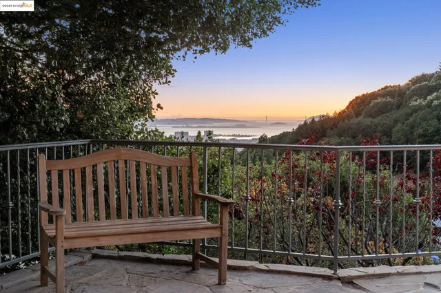 a view of a wooden deck with a bench