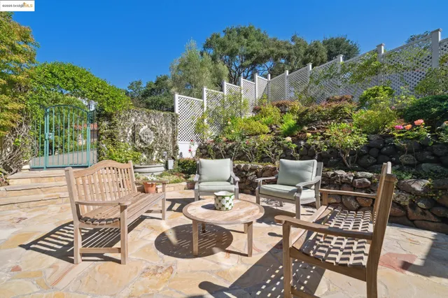 a view of outdoor dining space yard and patio