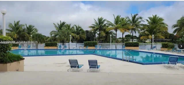 a terrace with a table and chairs