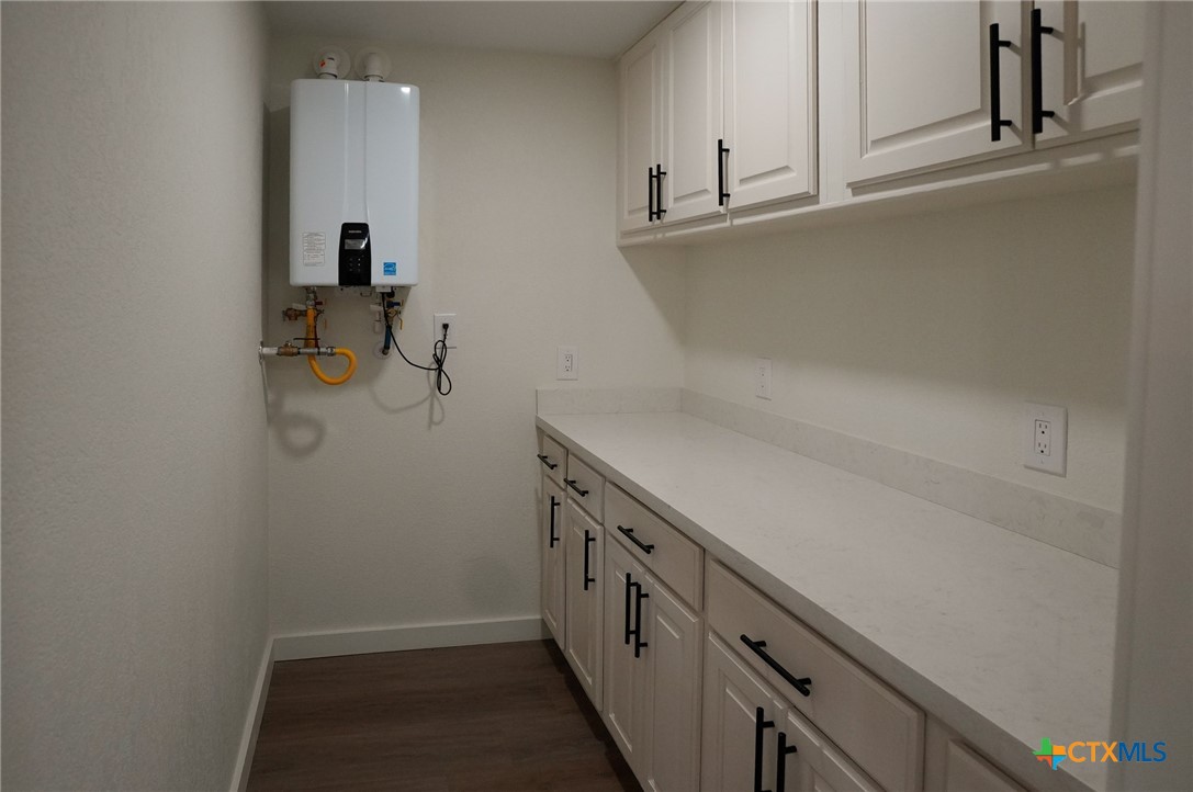 5688 Falke-Heinrich Road Schulenburg, TX 78956 - Photo 13 of 34 a view of storage and utility room with two washing machine