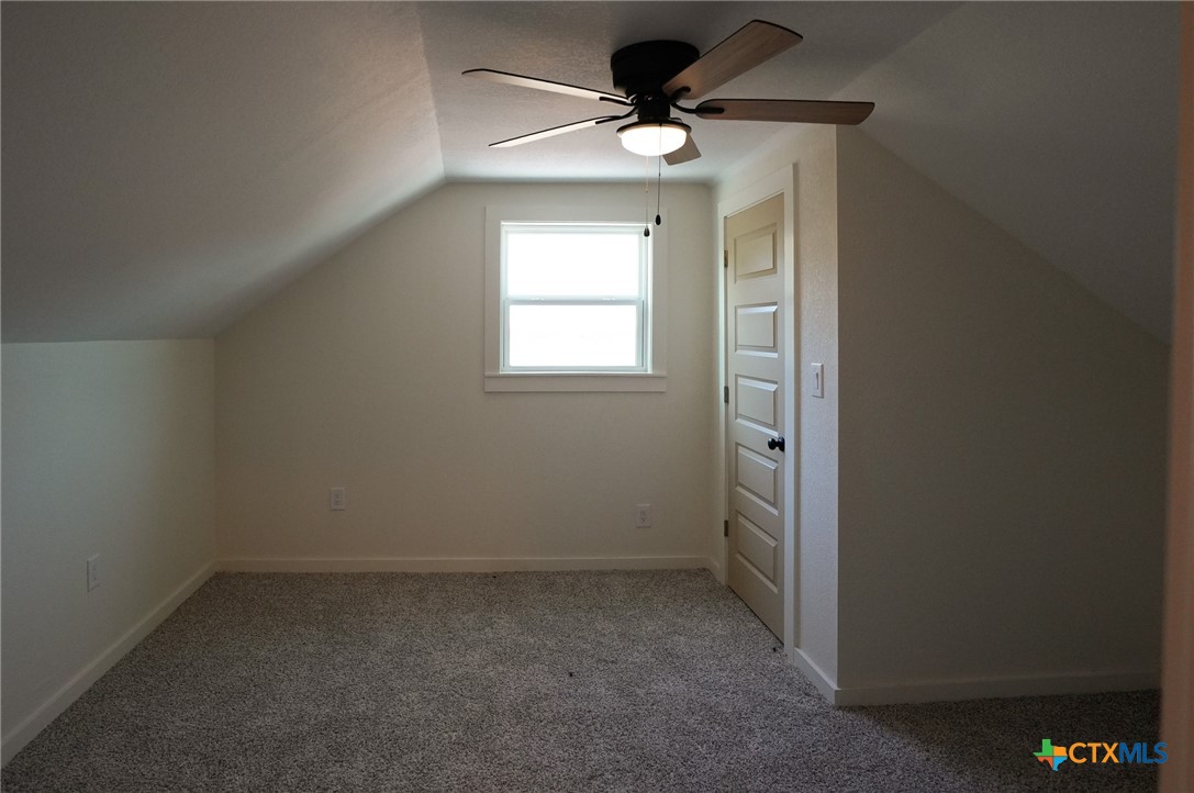 5688 Falke-Heinrich Road Schulenburg, TX 78956 - Photo 28 of 34 an empty room with a window and a fan