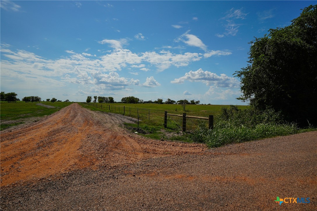 5688 Falke-Heinrich Road Schulenburg, TX 78956 - Photo 7 of 34 a view of a road with plants and trees