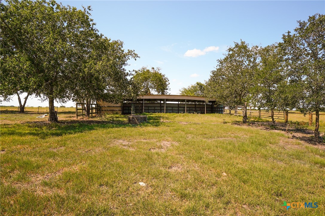 5688 Falke-Heinrich Road Schulenburg, TX 78956 - Photo 9 of 34 a view of a swimming pool with an outdoor space and seating area