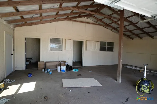 a view of cabinets and window
