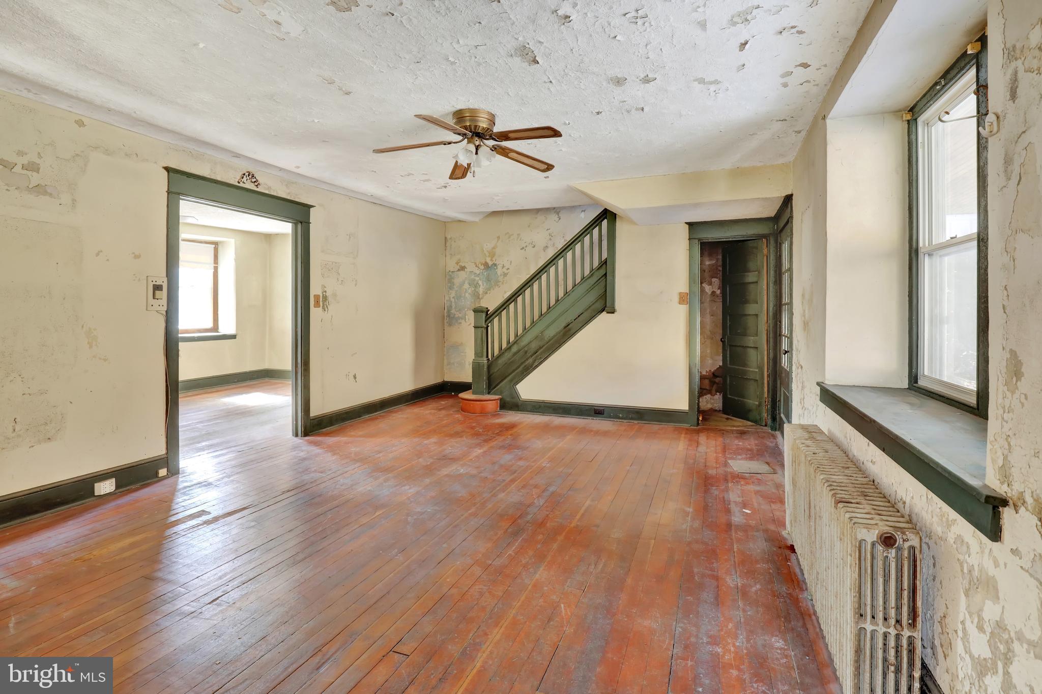 1250 New Philadelphia Road Pottstown, PA 19465 - Photo 5 of 30 wooden floor in an empty room with a window