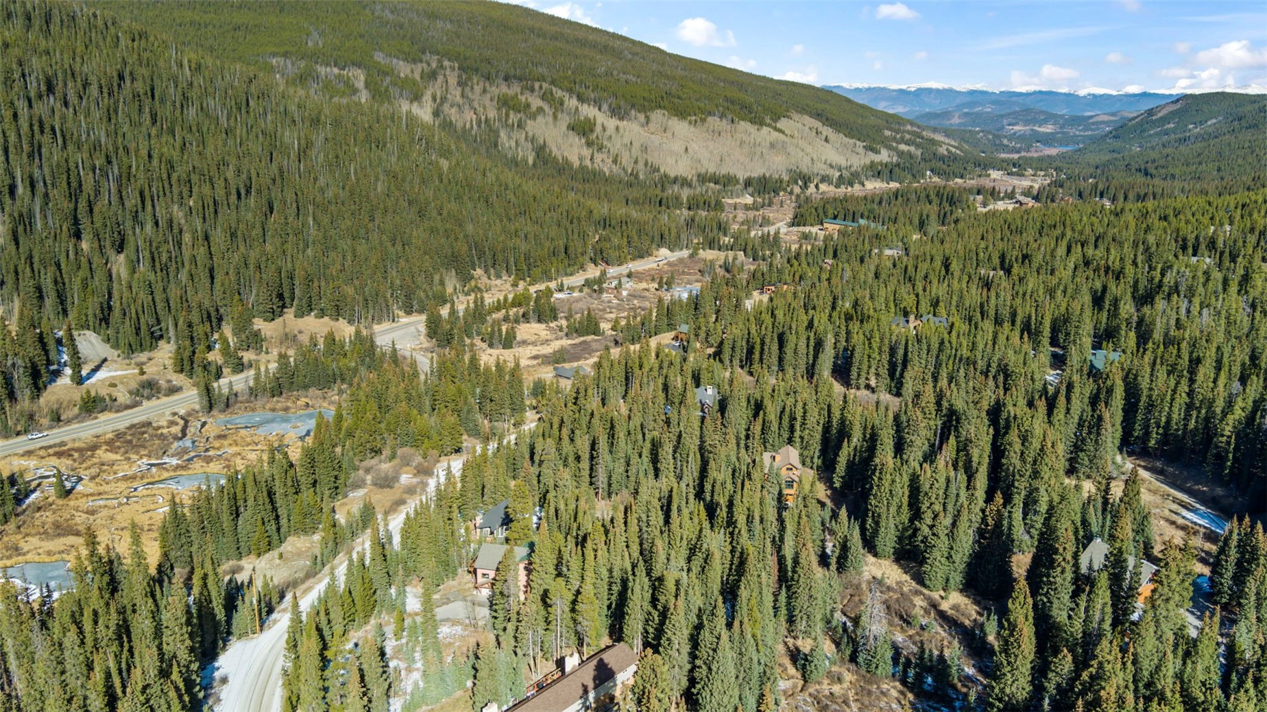 283 Range Road, Unit 1 Breckenridge, CO 80424 - Photo 10 of 11 The town of Breckenridge is a 10 minute drive from the condo. Breckenridge is at the end of the valley on the right side of the image.
