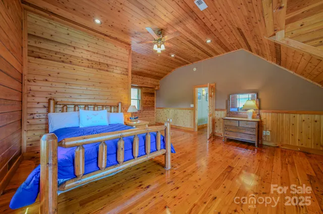 a bathroom with a sink a mirror and a shower