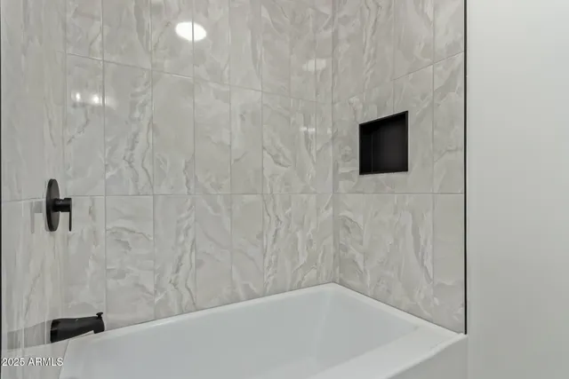 a bathroom with a bathtub