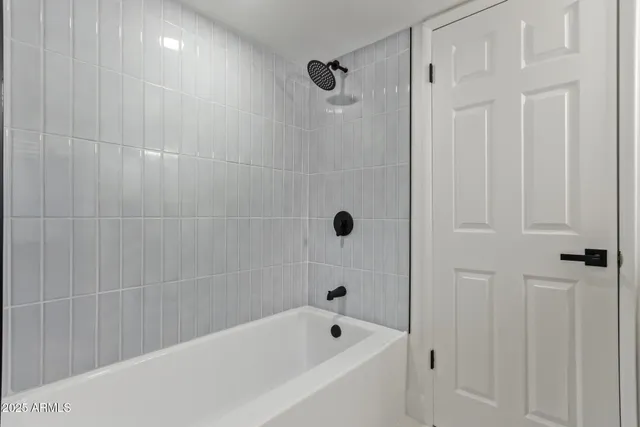 a bathroom with a bathtub