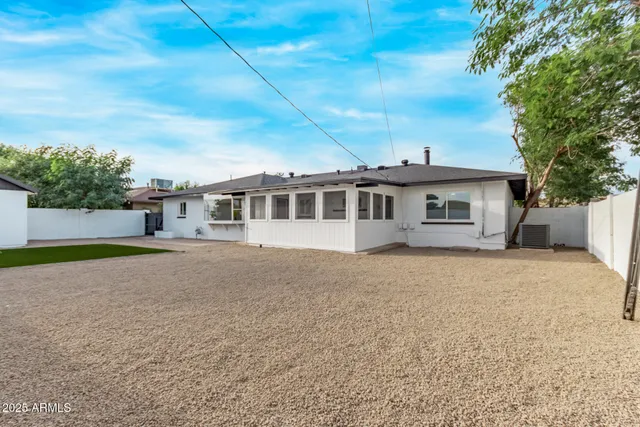 a house view with a garden space