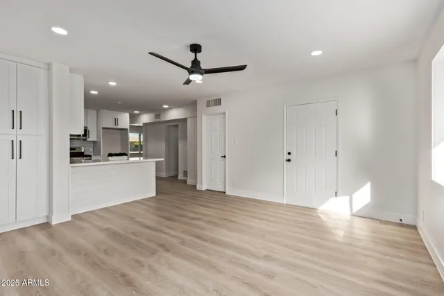 a view of kitchen with wooden floor