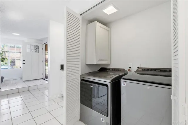 a kitchen with a stove and a refrigerator