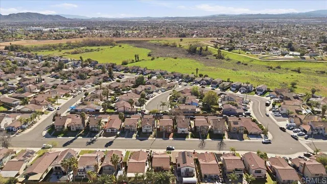 an aerial view of residential building and lake view