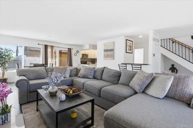 a living room with furniture and a couch